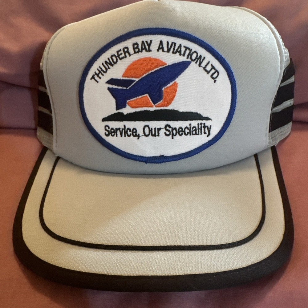 vintage trucker hat featuring a patch for "Thunder Bay Aviation Ltd" With Slogan